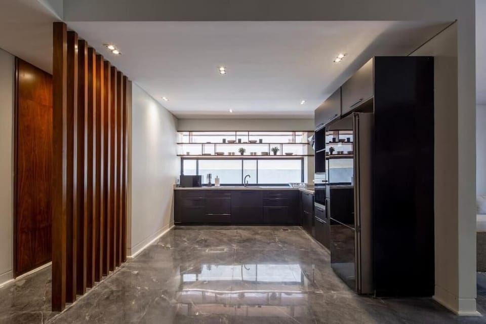 Apartment, Balcony, Garden View | Private kitchen | Electric kettle