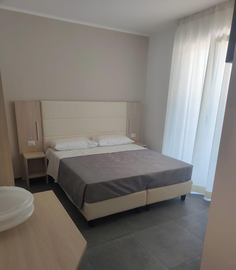 Family Quadruple Room, Balcony | In-room safe, blackout drapes, free WiFi