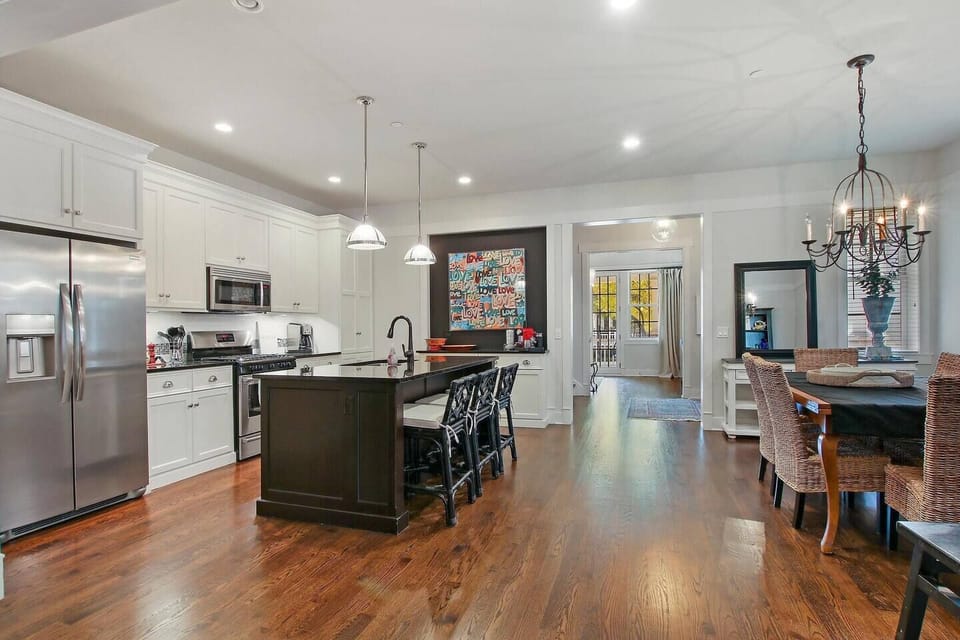 Fully stocked  kitchen open to dining area and living room