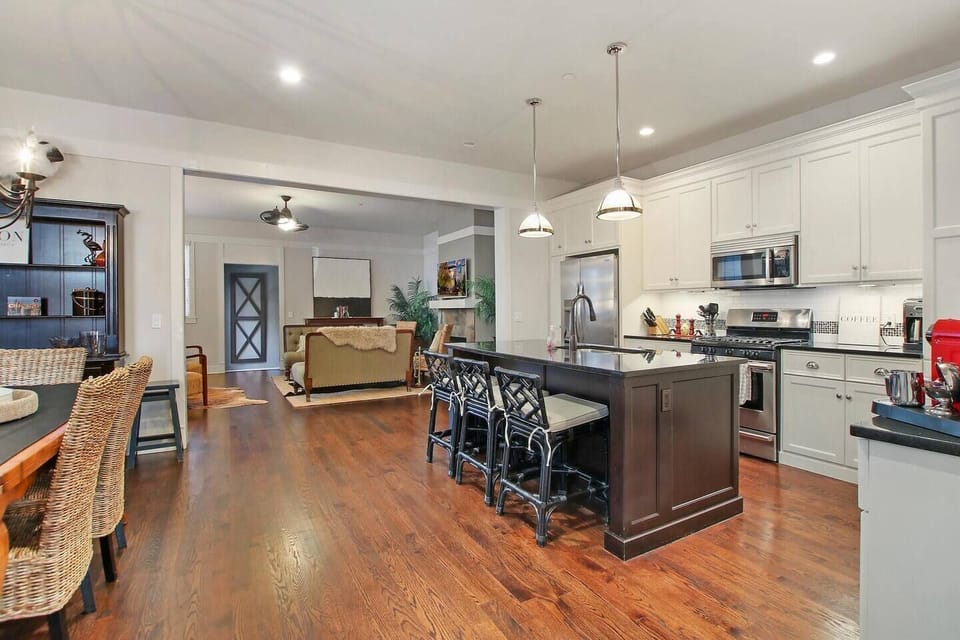 Open concept with 12 foot ceilings  kitchen dining and living areas