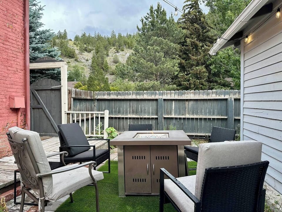 Our backyard with mountain views and propane fire pit