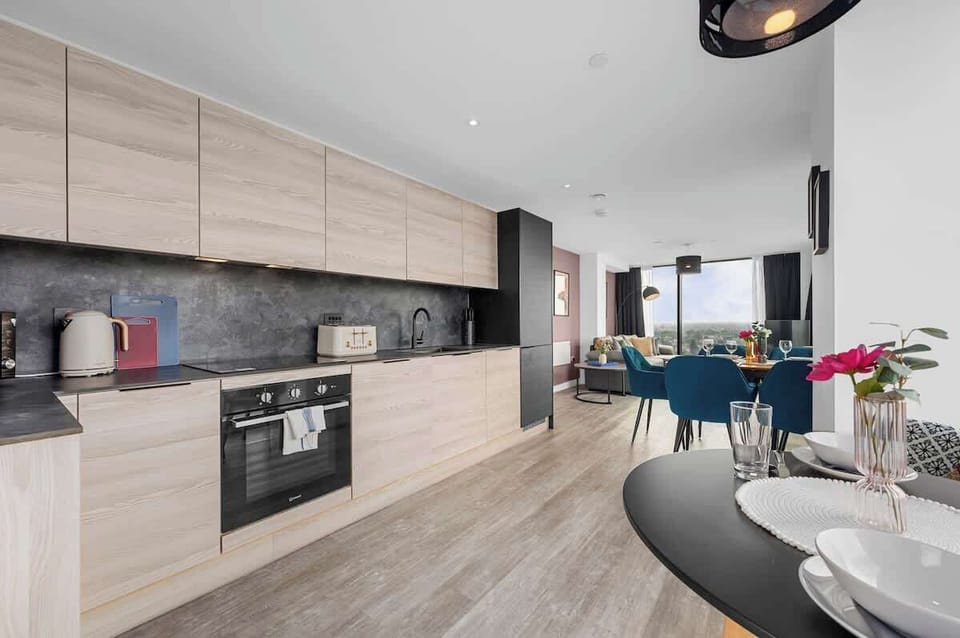 Fully equipped open plan kitchen with oven, hob and everything you need to cook a meal or grab a quick coffee