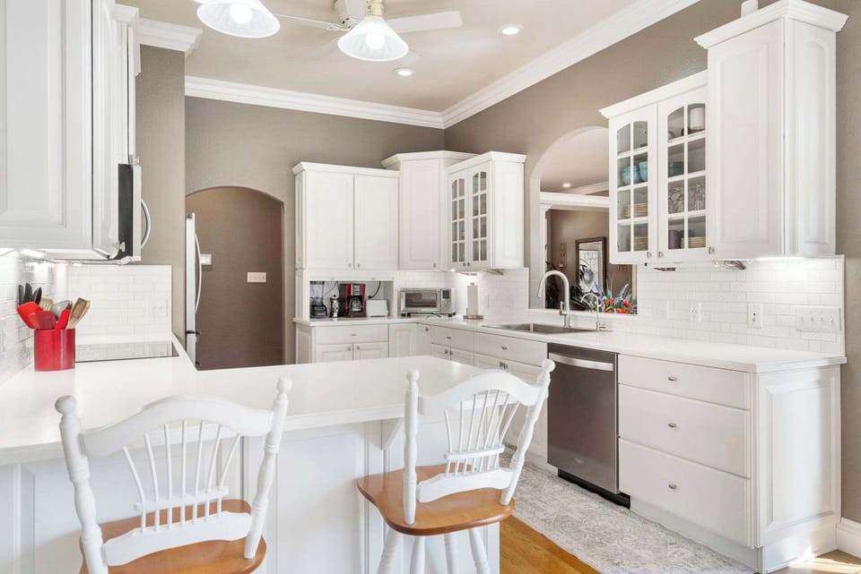Fully stocked kitchen, including kids ware and booster/high chair