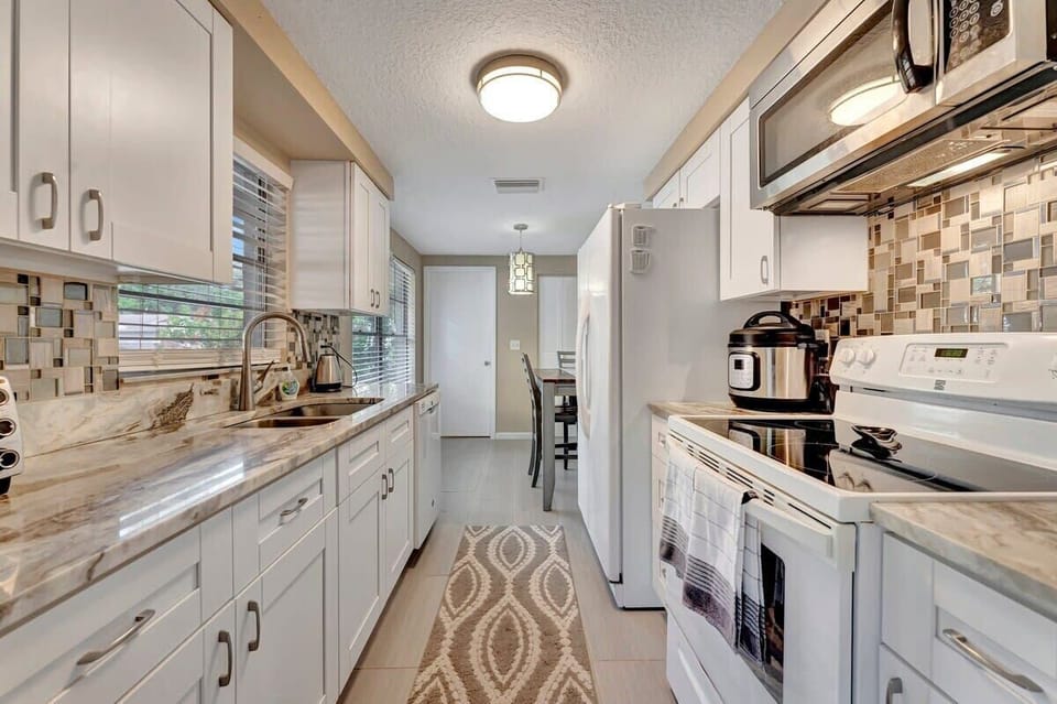 Cook like a pro in our sunny, fully stocked kitchen—bon appétit!