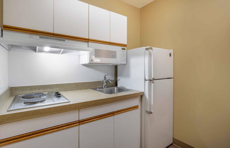 Studio, 1 Queen Bed, Accessible, Non Smoking | Private kitchen | Coffee/tea maker, full-size fridge, microwave, stovetop