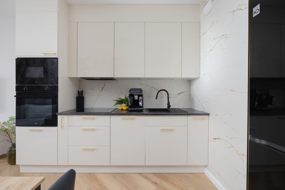 Cook and dine in style with the modern kitchenette and dining area.