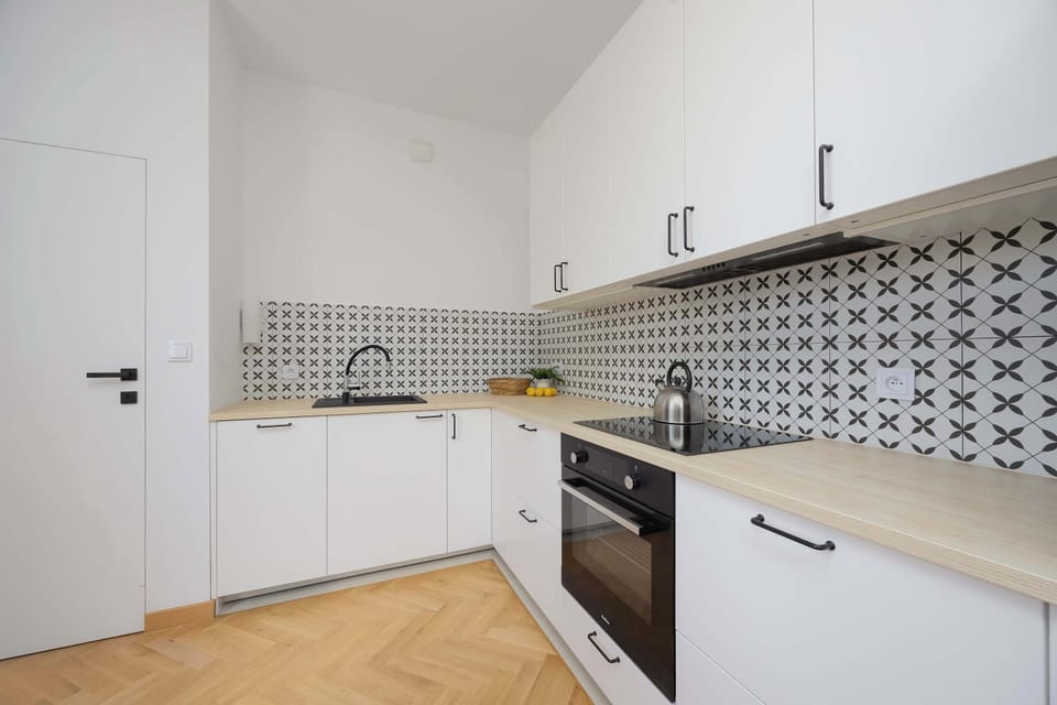 The fully equipped kitchenette includes everything you need for a home-cooked meal.