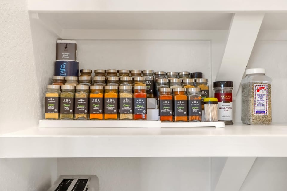 The chic, open kitchen offers ample space & every home comfort​