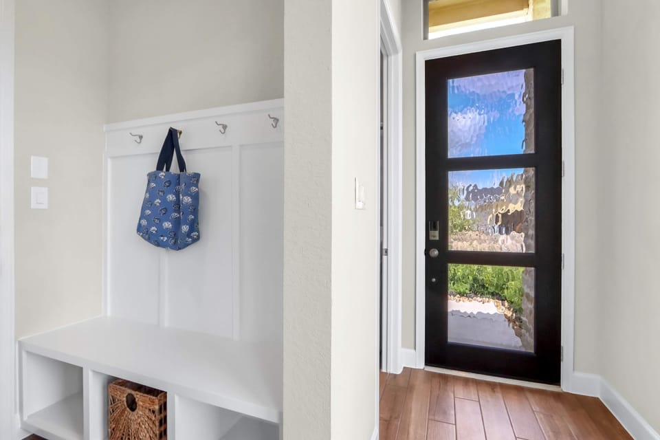 Store shoes & bags in the convenient mudroom area, just off the entrance​