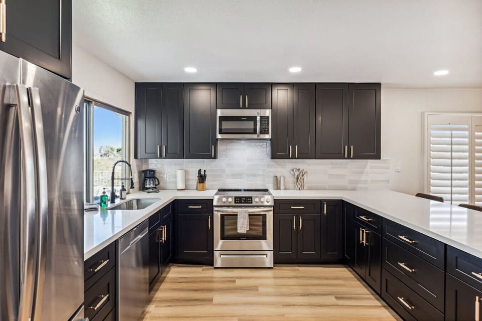Kitchen equipped with stainless steel appliances
