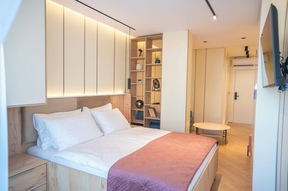 Deluxe Apartment, Balcony, City View | Blackout drapes, free WiFi