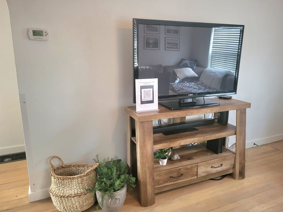 Smart TV in living room (and another in upstairs bedroom)
