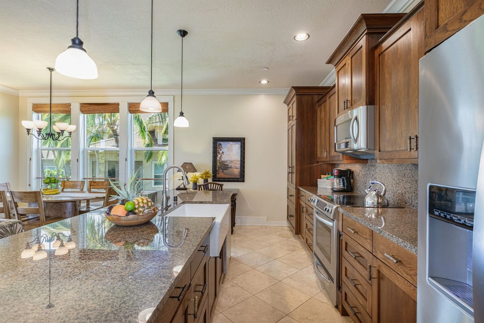 Beautiful kitchen with granite counter tops.