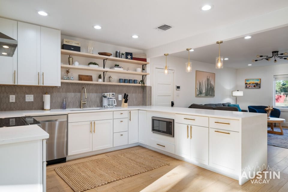 Three stools in the kitchen bar. Perfect for morning chats, snack breaks, or planning the day ahead.