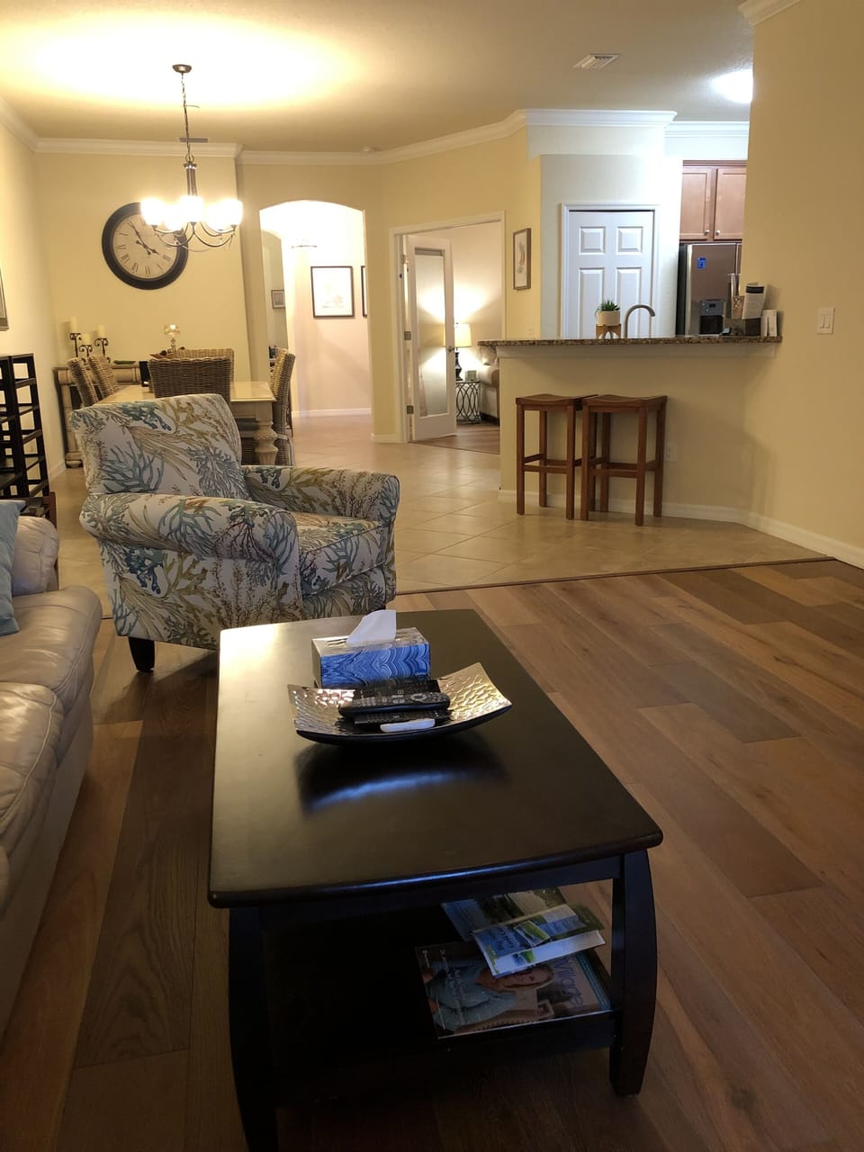 Comfortable, clean open concept living/dining room.