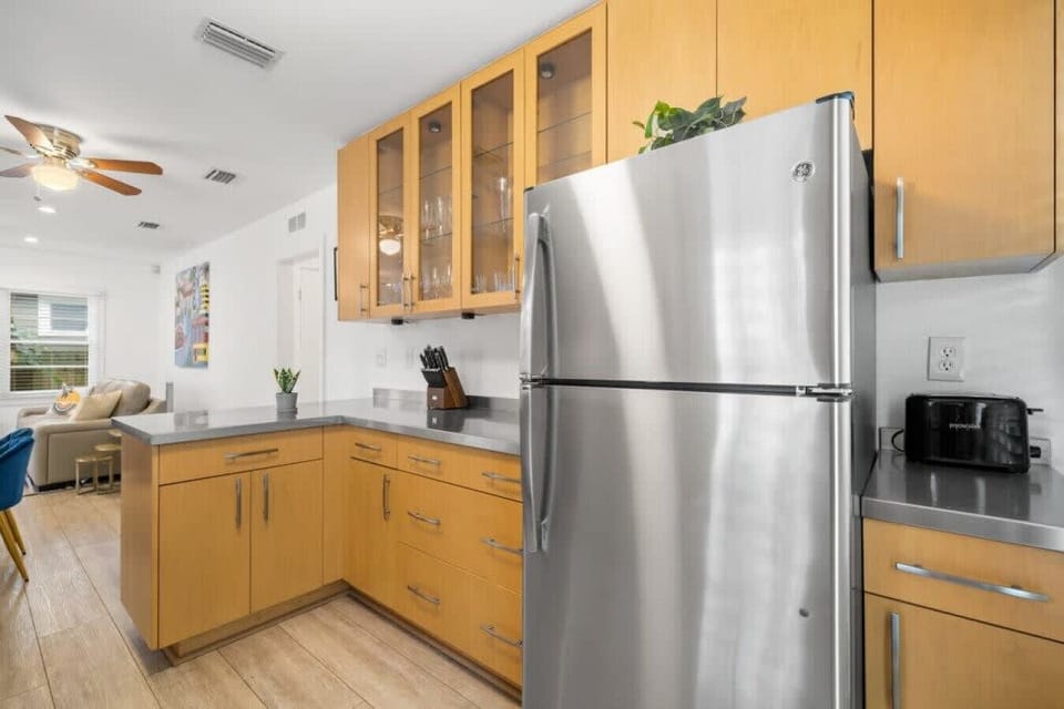Fully stocked kitchen with stainless steel appliances