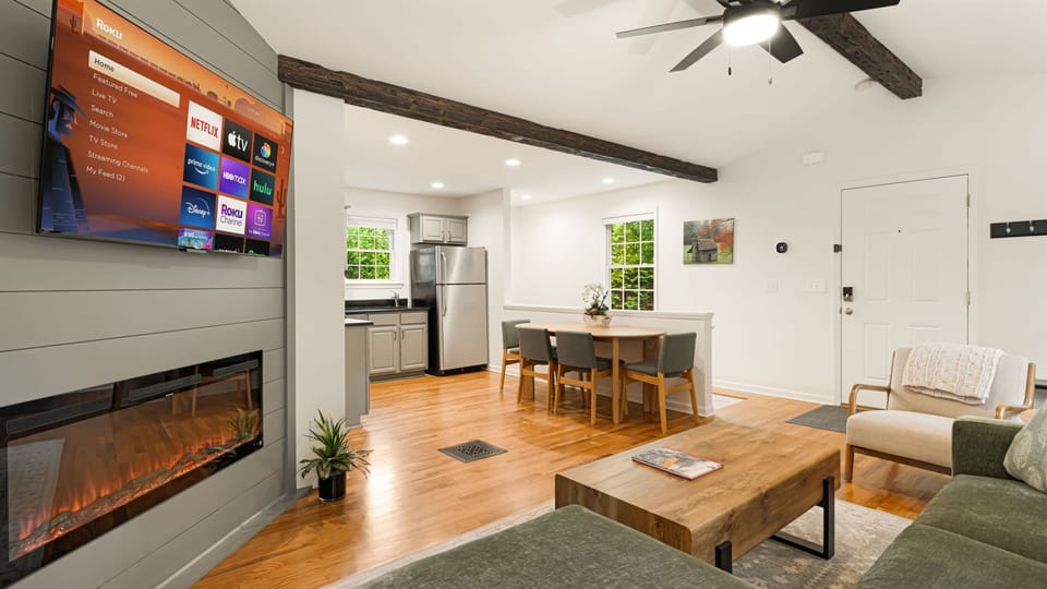 Pull up whatever you’re watching on the 55-inch 4K Roku Smart TV, let the electric fireplace take the chill off the mountain evening, and settle in. The nights go long here.
