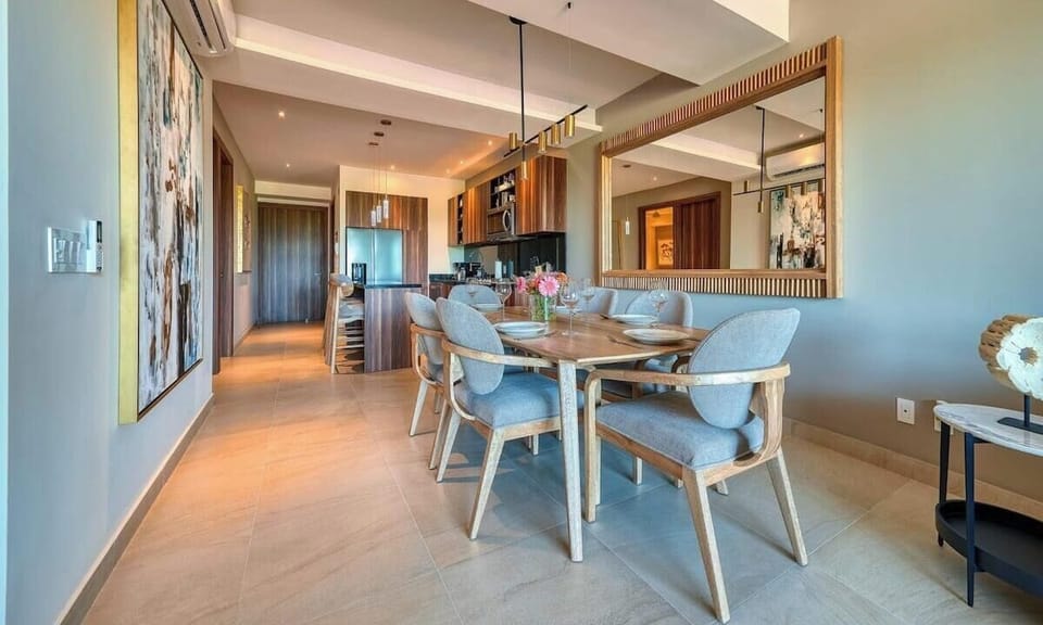 Cozy living area with comfortable furnishings and integrated kitchen access.