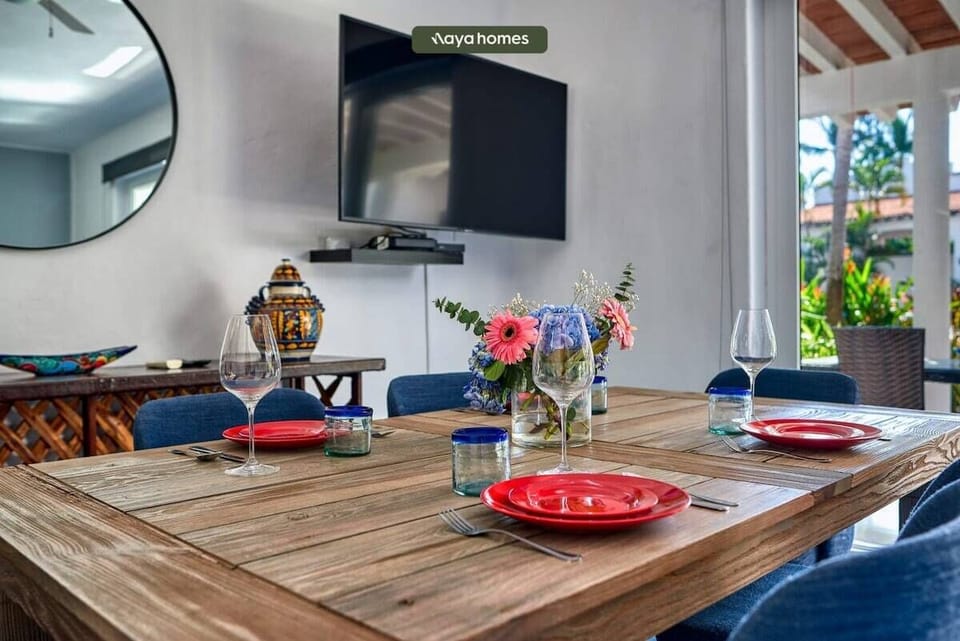 Enjoy meals together at the cozy dining table, seamlessly connected to the living area for easy entertaining and everyday comfort.