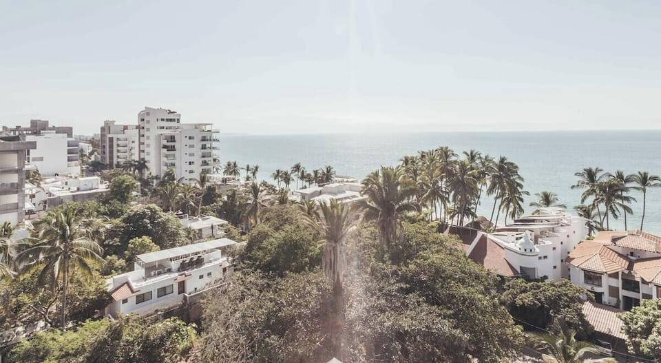 Take in sweeping views of the ocean and surrounding tropical landscape from the rooftop terrace.