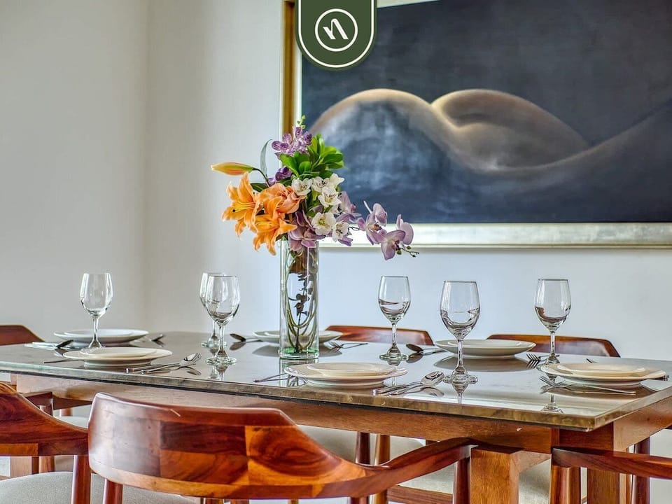 Stylish dining space with seating for meals or gatherings, designed for comfort and connection.