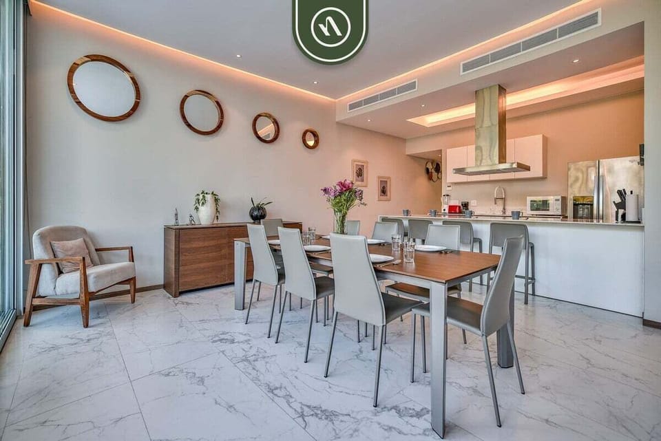Share memorable meals in the stylish dining space, perfectly positioned beside the gourmet kitchen and open living room.