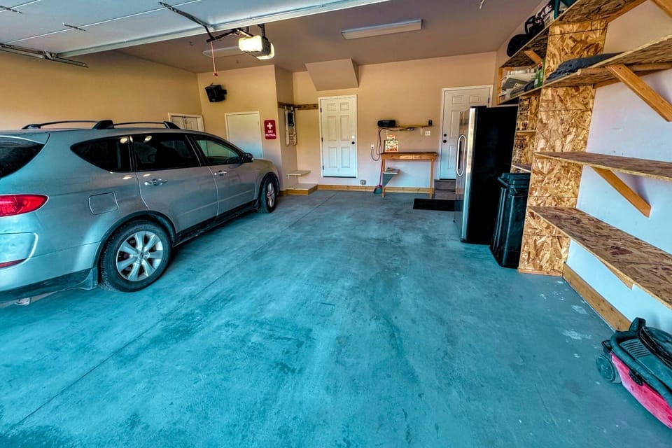 Keep your vehicle and gear dry using the available garage stall! (The owners keep a vehicle parked in one of the garage stalls.)