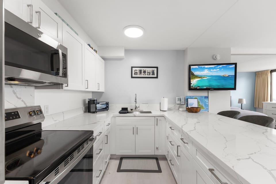 Standard Apartment, Lanai, Ocean View | Private kitchen | Stovetop, electric kettle, cookware/dishes/utensils