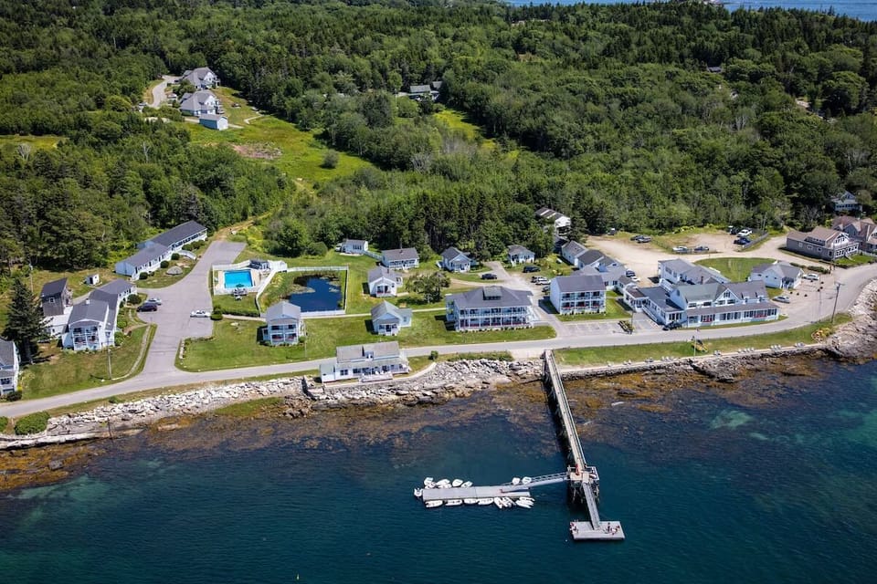Discover the waterfront campus with pool, dock, and cottages.