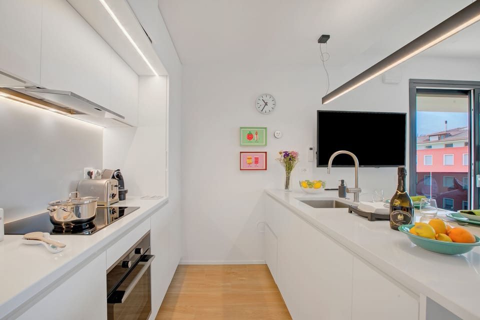 Family Apartment, Multiple Bedrooms, 2 Bathrooms (Sole E Lago) | Private kitchen | Fridge, microwave, oven, stovetop