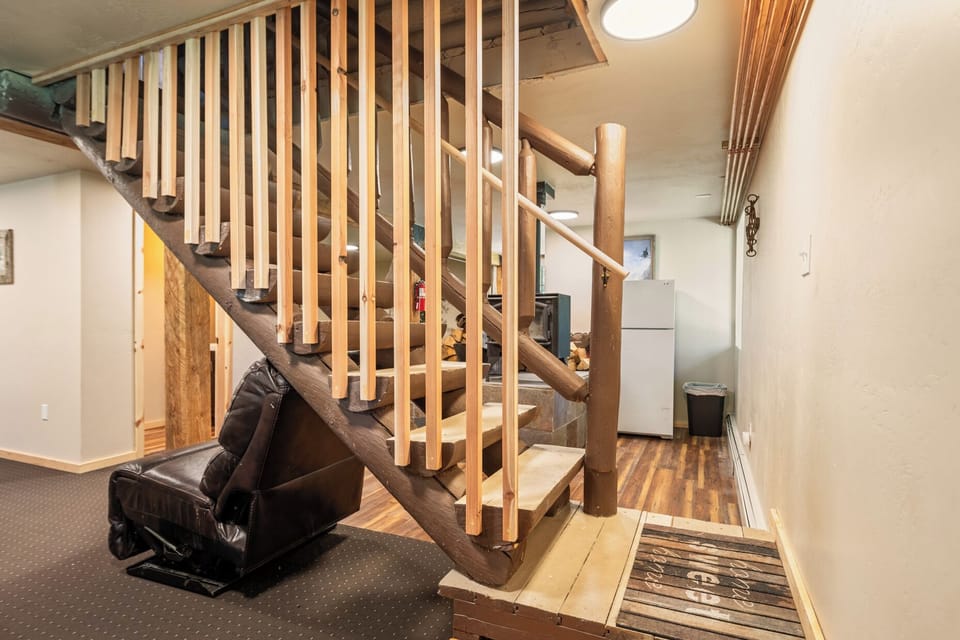 Bottom of stairs in basement. 