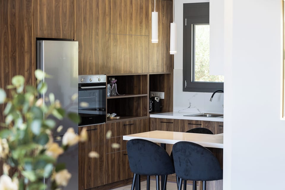 Natural textures and clean lines define this serene, stylish kitchen.