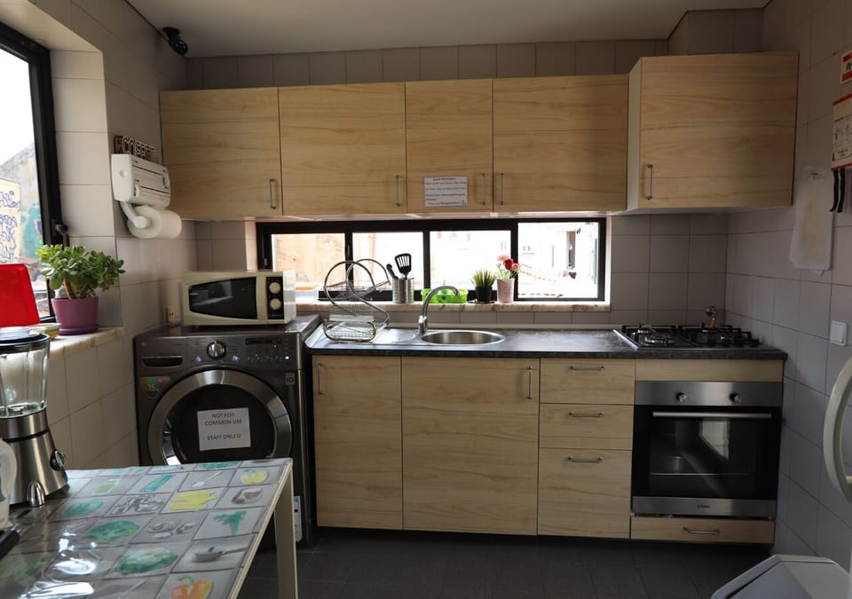 Shared fridge, microwave, cookware/dishes/utensils