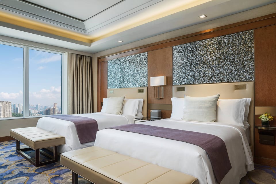 Premium bedding, down comforters, minibar, in-room safe