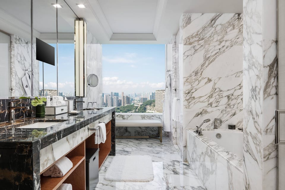 Separate tub and shower, deep soaking tub, designer toiletries