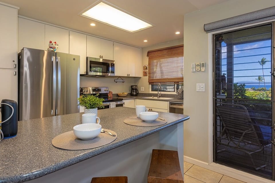 Condo, 1 Bedroom | Private kitchen | Fridge, oven, coffee/tea maker, toaster
