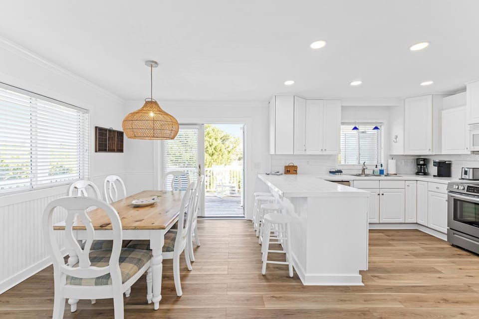 OPEN KITCHEN AND DINING TO BACK DECK