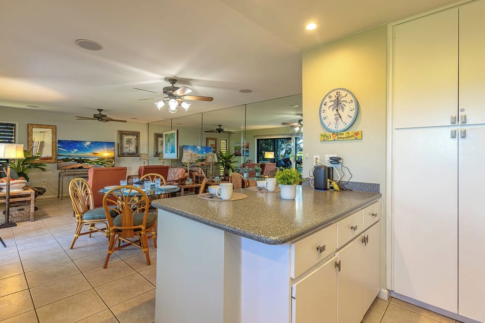 This open-concept kitchen and living area offers plenty of space for your group to gather, cook, and relax together in comfort.