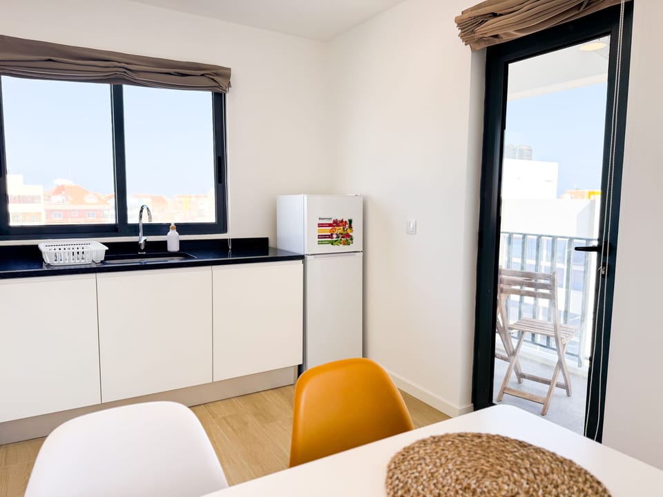 Apartment, 1 Bedroom, Balcony | Private kitchenette | Fridge, microwave, oven, stovetop