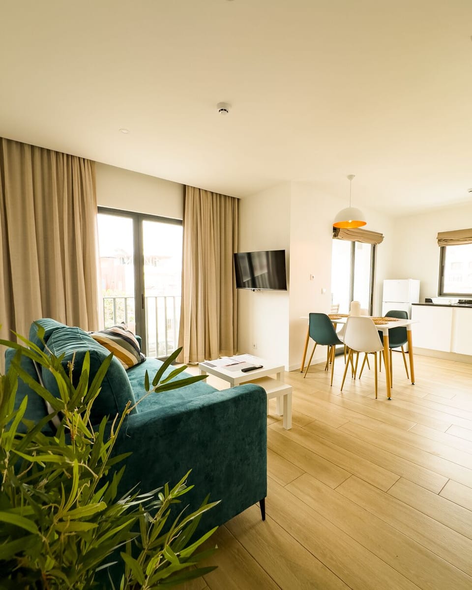 Apartment, 1 Bedroom, Balcony | Living area | TV