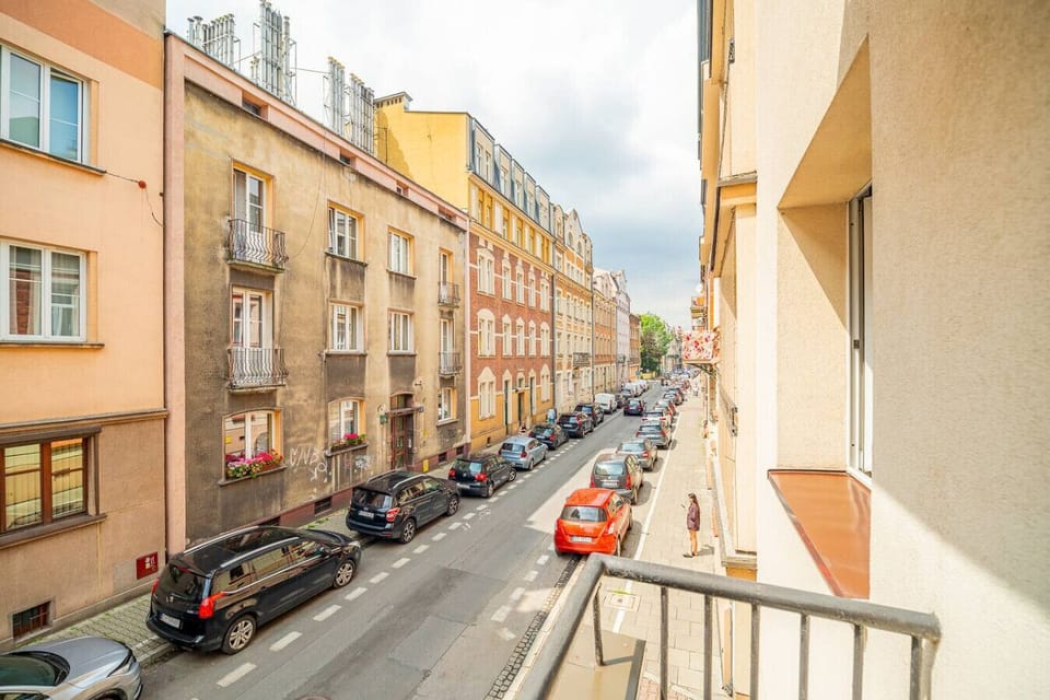 Balcony with a Historical Street View | Book Now with RENTUJEMY