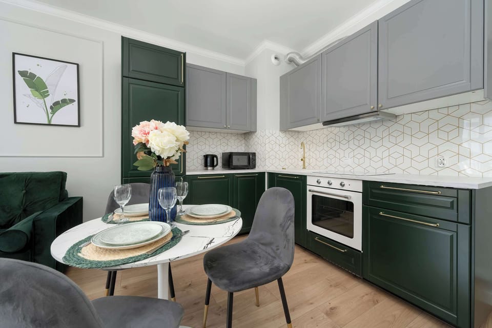 The fully equipped kitchenette includes everything you need for a home-cooked meal.