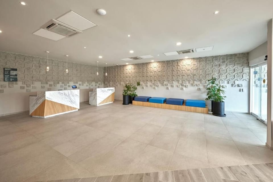 Arrive with ease to a bright, spacious reception lobby.