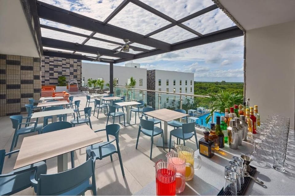 Sip and unwind on the rooftop terrace with sweeping views.