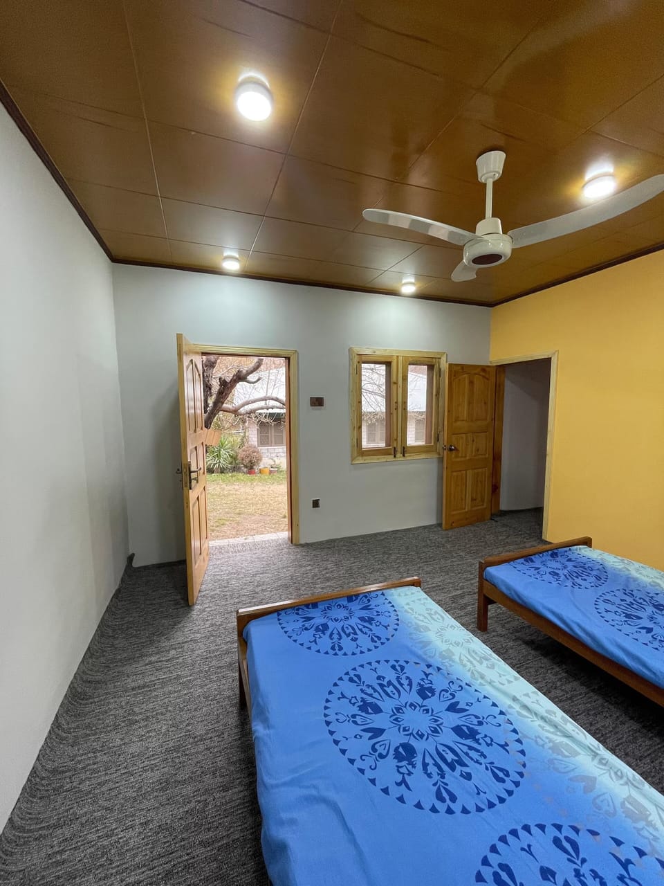 Spacious master bedroom with natural light and serene vibes.
