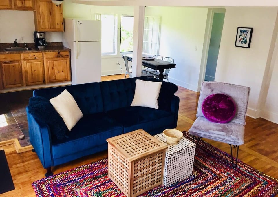 Open living space with convertible couch 