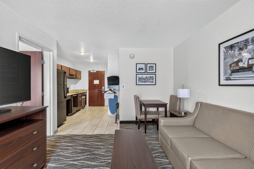 Suite, Mobility Accessible, Non Smoking (Singe King, Extended Stay) | Desk, laptop workspace, blackout drapes, iron/ironing board