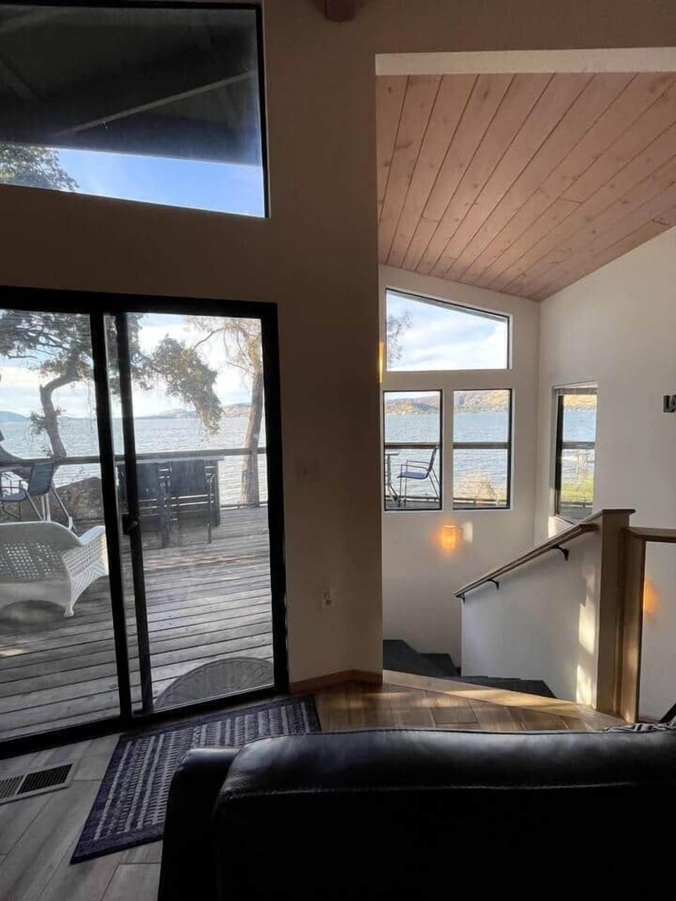 Upstairs sliding door out to upper deck.  Stairs leading to 2nd level rooms.