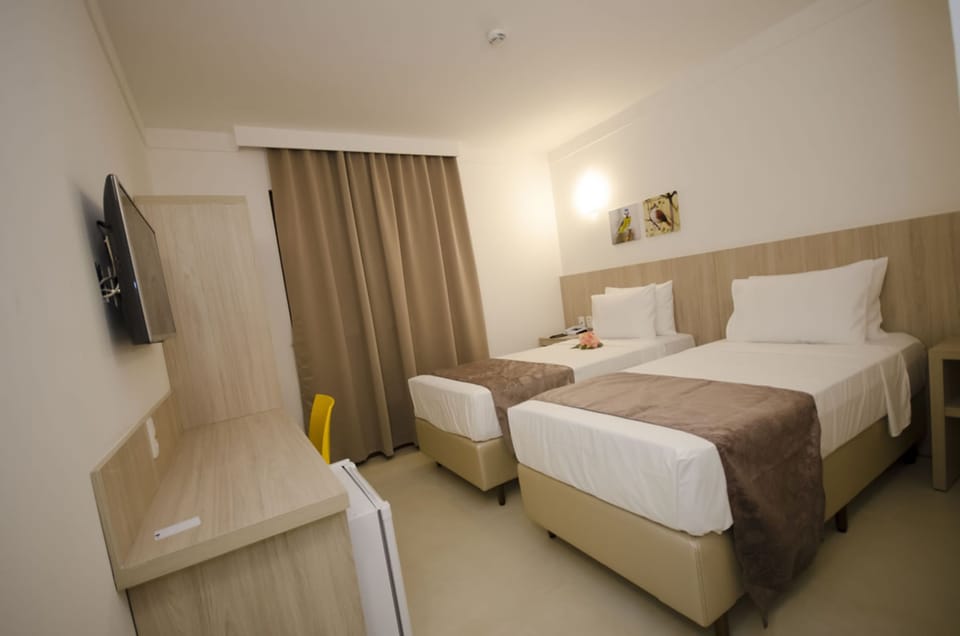 Standard Double or Twin Room | Minibar, desk, laptop workspace, soundproofing
