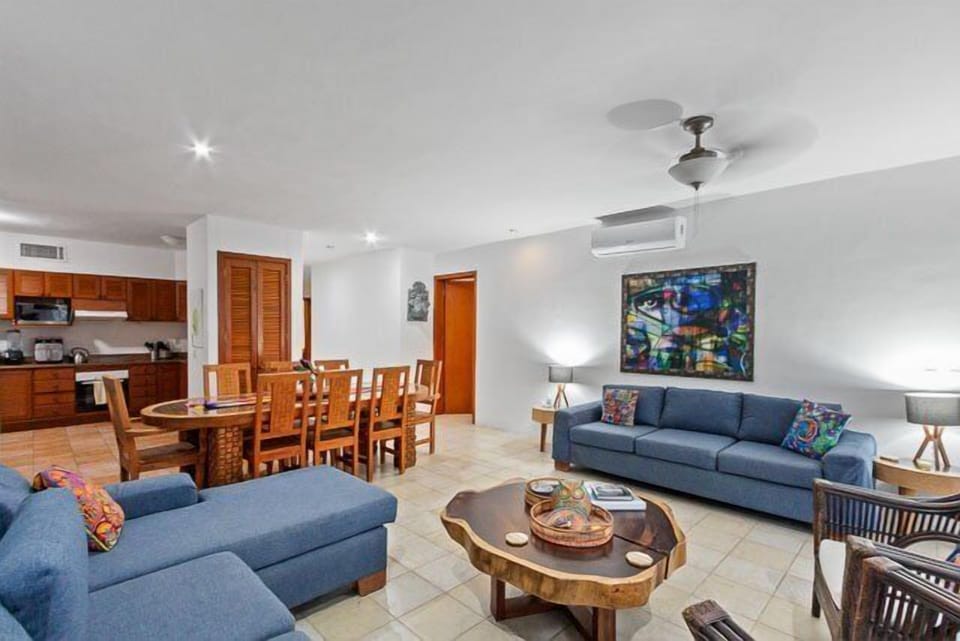 Living room with dining room in the background